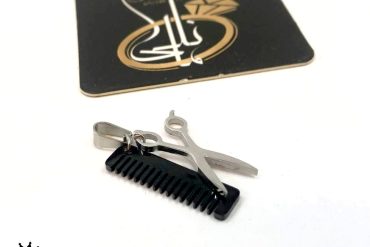 پلاک شانه و قیچی