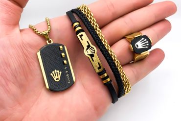 ست دستبند و انگشتر و گردنبند رولکس مردانه با رنگ مشکی طلایی