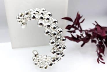 دستبند النگویی پهن نقره ای از جنس استیل