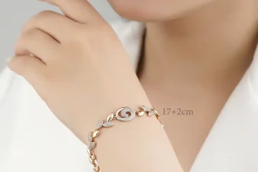 دستبند ژوپینگ طرح گل و برگ نگین دار