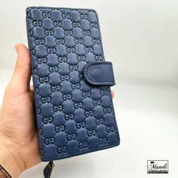 کیف پولی زیپ دار چرم طرح دار | سورمه‌ای، مشکی، عسلی