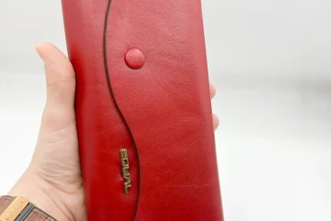 کیف پولی چرم زیپدار | مشکی و قرمز | چرم طبیعی گاوی