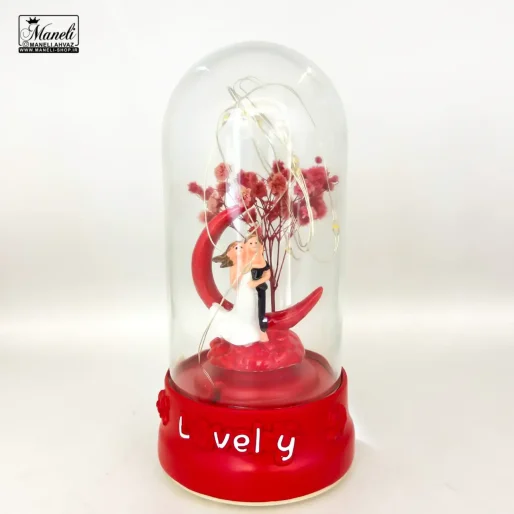 گوی موزیکال شیشه ای عروس و داماد، هدیه‌ای ماندگار برای لحظات عاشقانه