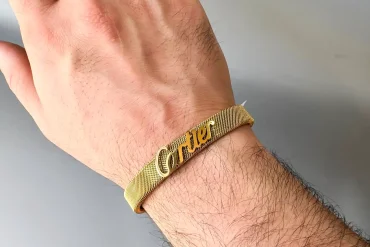 بنگل حصیری مردانه رنگ طلایی با نوشته Cartier - استیل 14031242