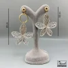 خرید گوشواره استیل گل نامتقارن زنانه با رنگ ثابت