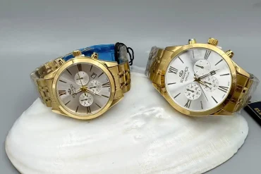 ست ساعت الگانس طلایی بند استیل- ساعت عروس و داماد14040313