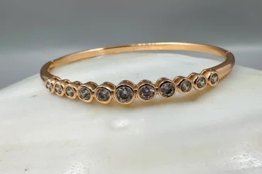 دستبند زنانه النگویی طلایی برند ژوپینگ|14040453