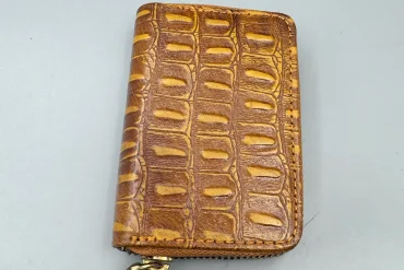 کیف جاکارتی زیپی چرم رنگ عسلی طرح دار 14040602