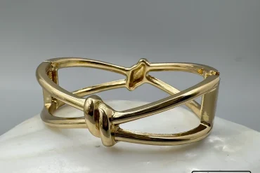 دستبند استیل طلایی طرح گره زنانه رنگ ثابت|14040632