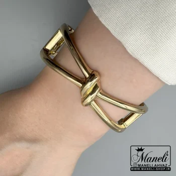 دستبند استیل طلایی طرح گره زنانه رنگ ثابت|14040632 - Image 2