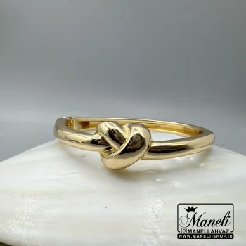 دستبند استیل طلایی طرح گره زنانه رنگ ثابت|14040633