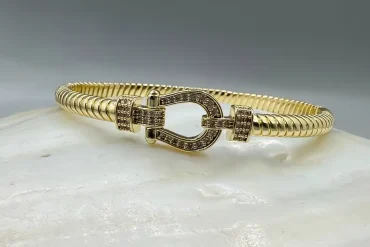 دستبند امگا زنانه طلایی