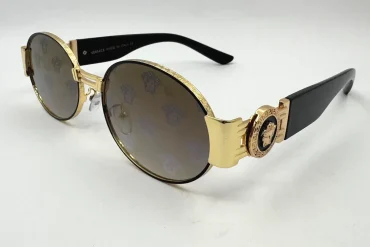 عینک UV برند versace با فریم طلایی و شیشه مشکی